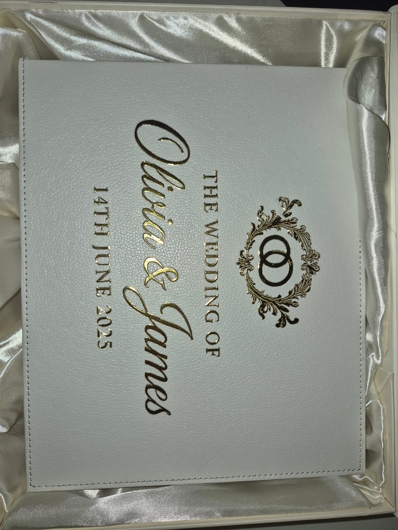 Personalised white book cover with gold foil names and date