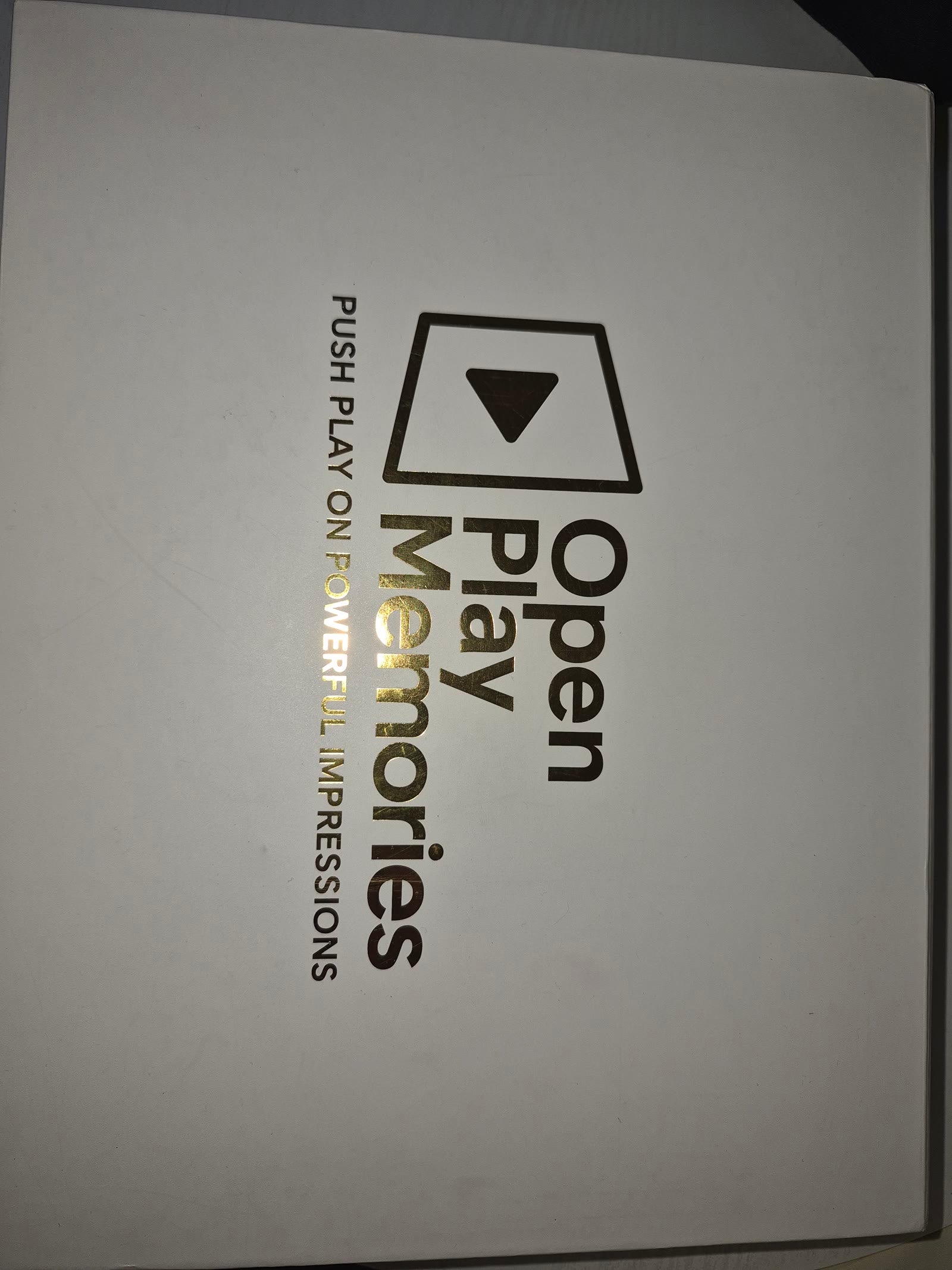 Premium gift box with gold Open Play Memories branding
